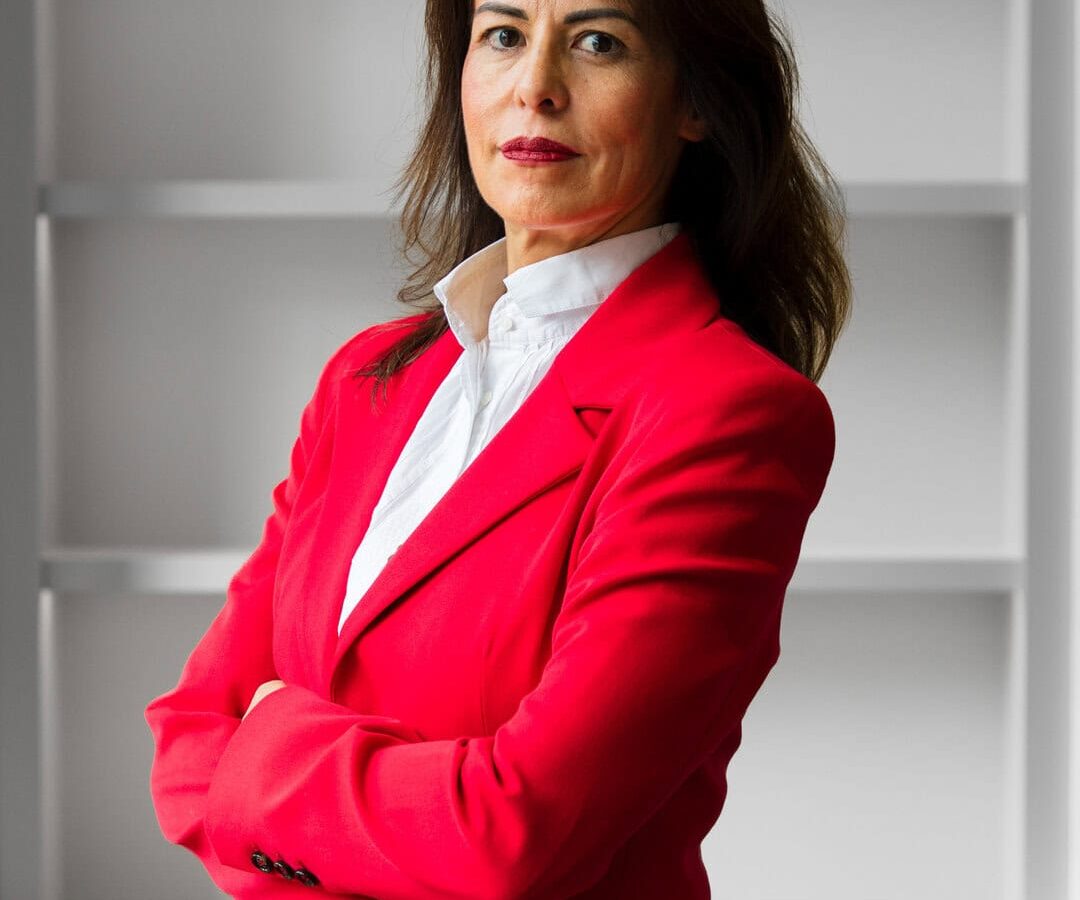 Professional corporate headshot on a clean background