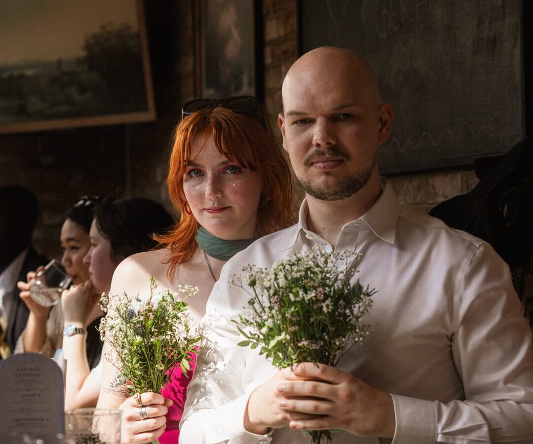 Queer couple on their wedding day in London