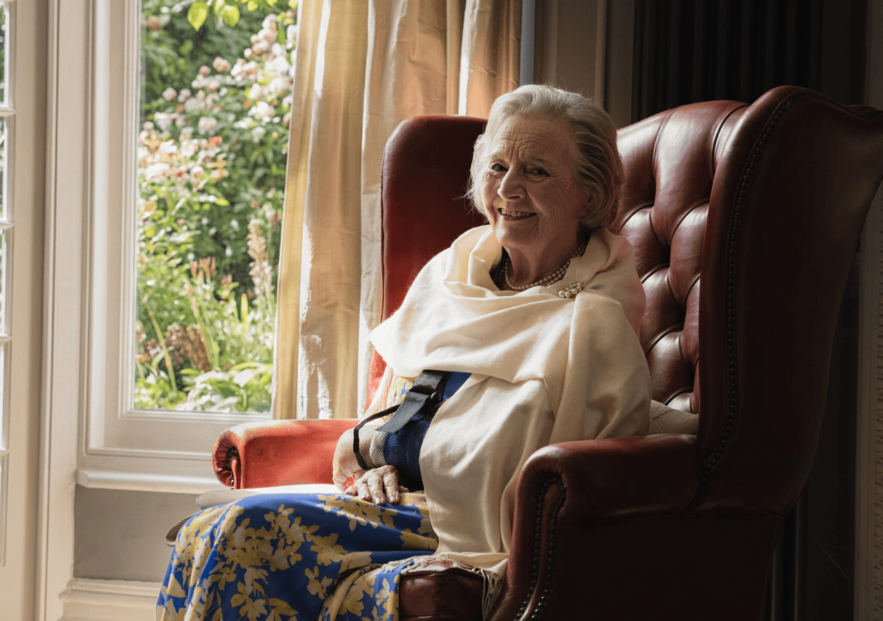 Environmental portrait of an older woman at home