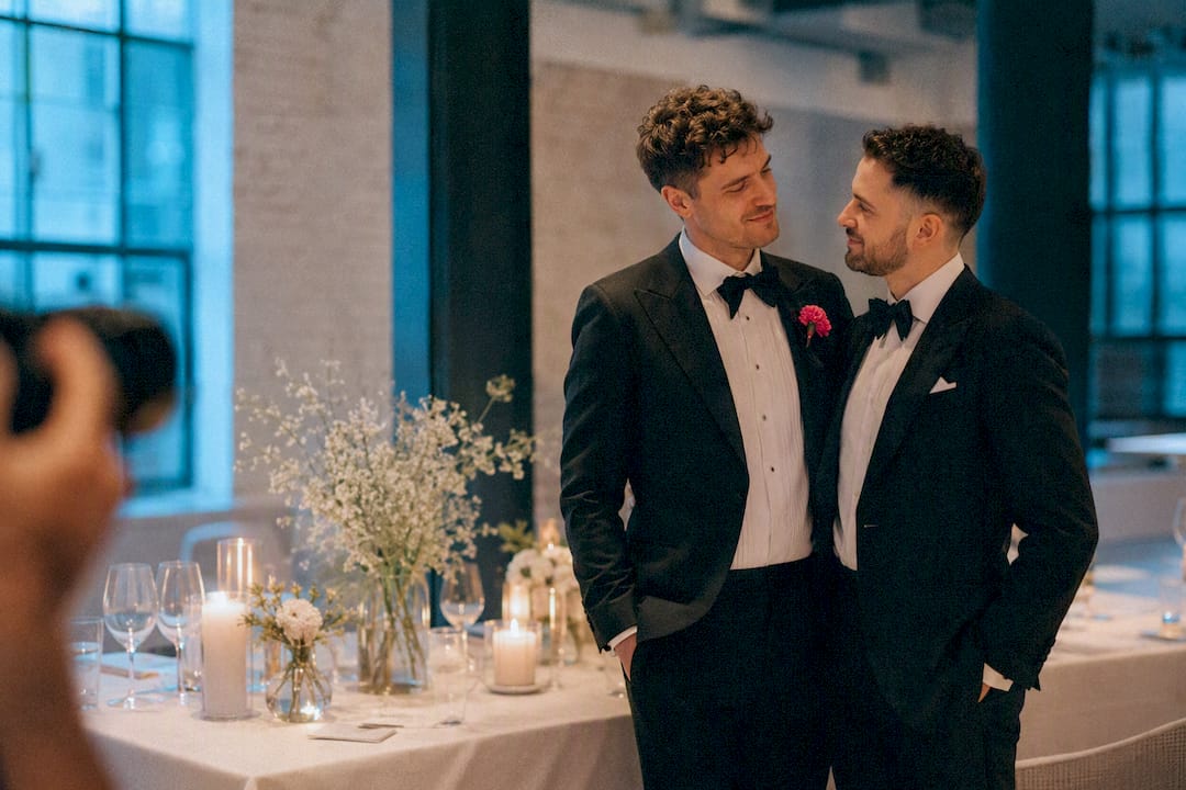 Two grooms photographed at a UK wedding