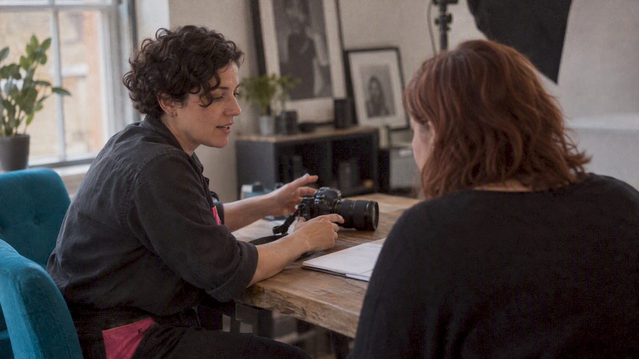 Photographer discussing RAW delivery terms before booking