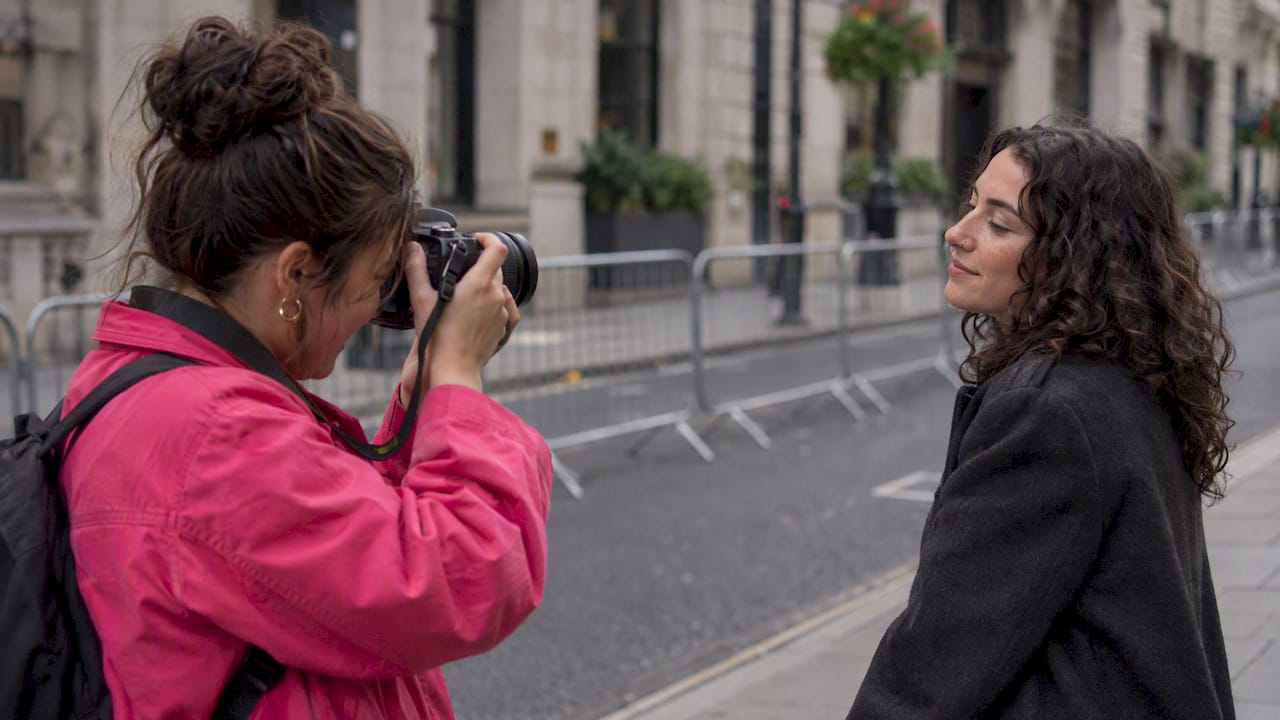 Two women making a Pride portrait in London